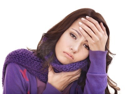 Young woman with handkerchief having  cold. Isolated.